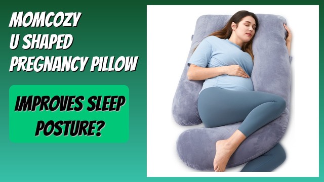 Momcozy U-shaped full body pregnancy pillow on a bed