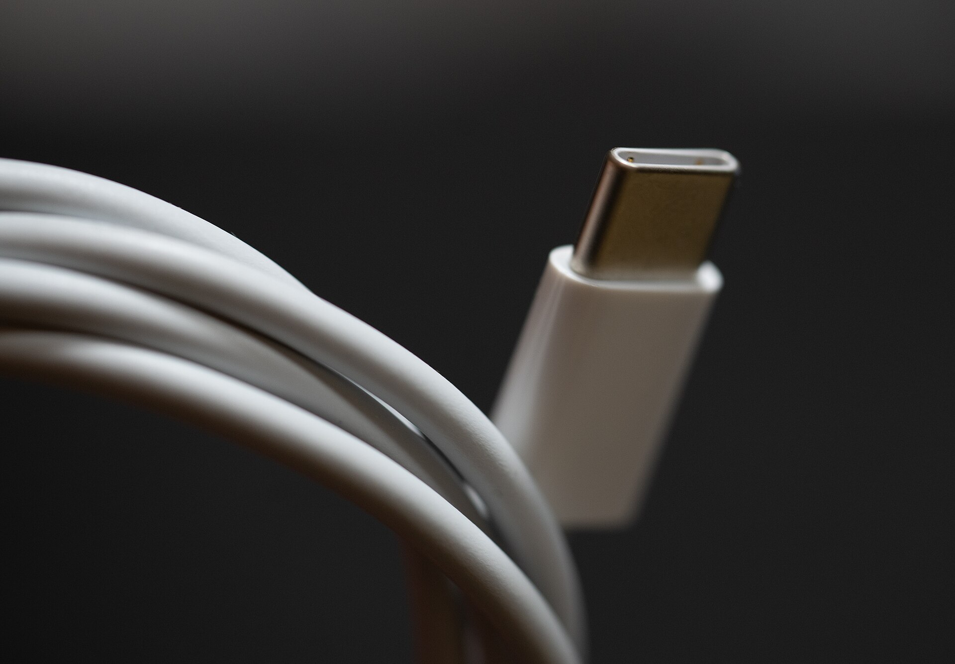 Close-up of a white USB-C cable plug