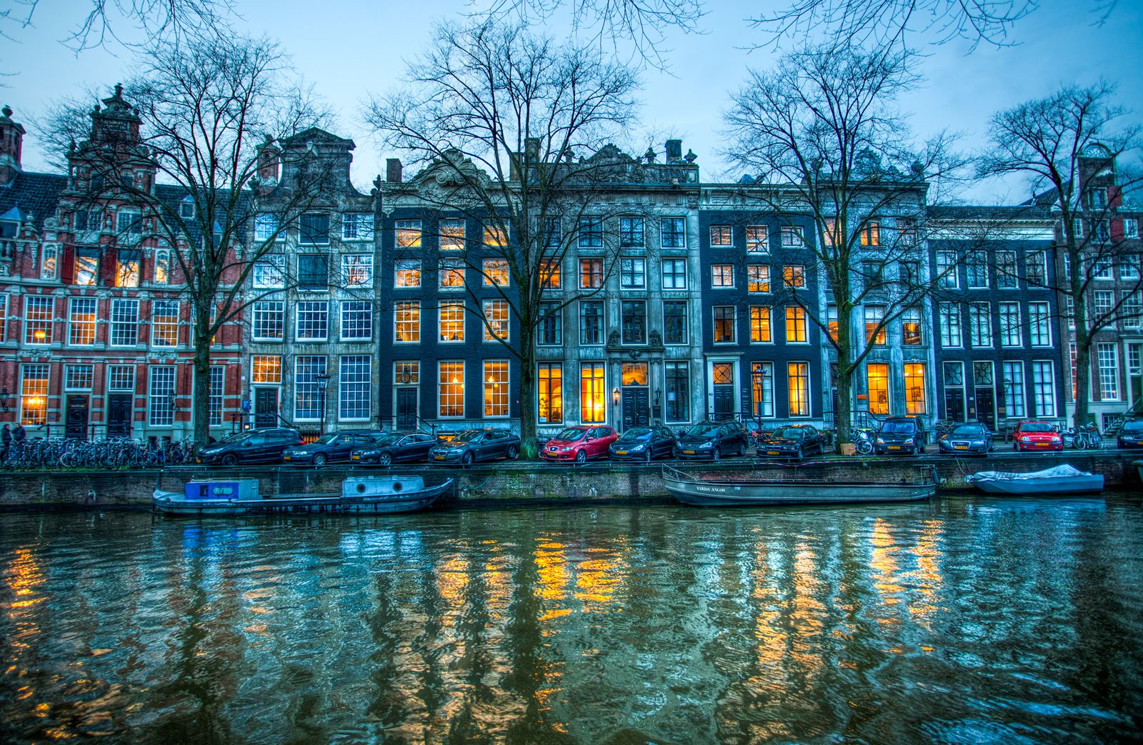 Gabled canal houses along the Herengracht in Amsterdam at dusk