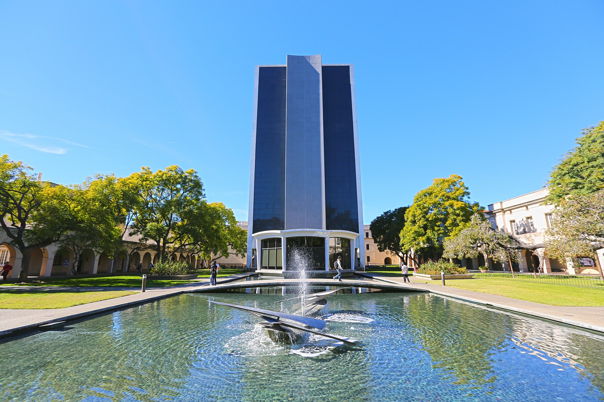 Millikan Library rising behind the long reflecting pool at Caltech in Pasadena