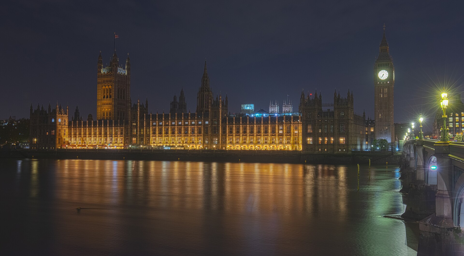 The Palace of Westminster and the Elizabeth Tower beside the River Thames in London