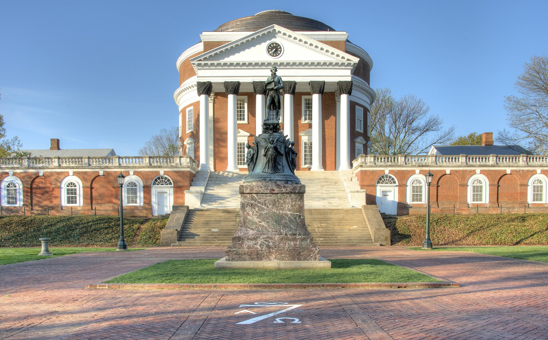 The Rotunda at the University of Virginia with the statue of Thomas Jefferson in front