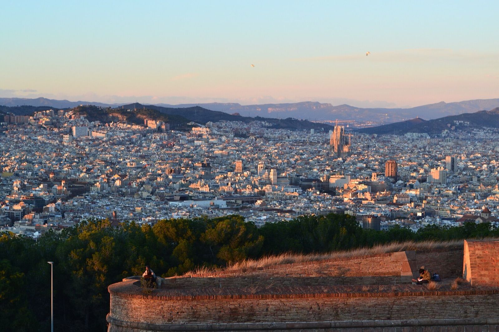 Central Barcelona seen from Montjuïc, with the Sagrada Família and the Collserola hills behind
