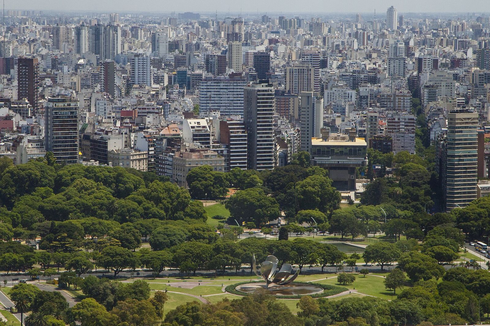 Aerial view of Recoleta in Buenos Aires, with parkland and the Floralis Genérica sculpture in front of apartment towers