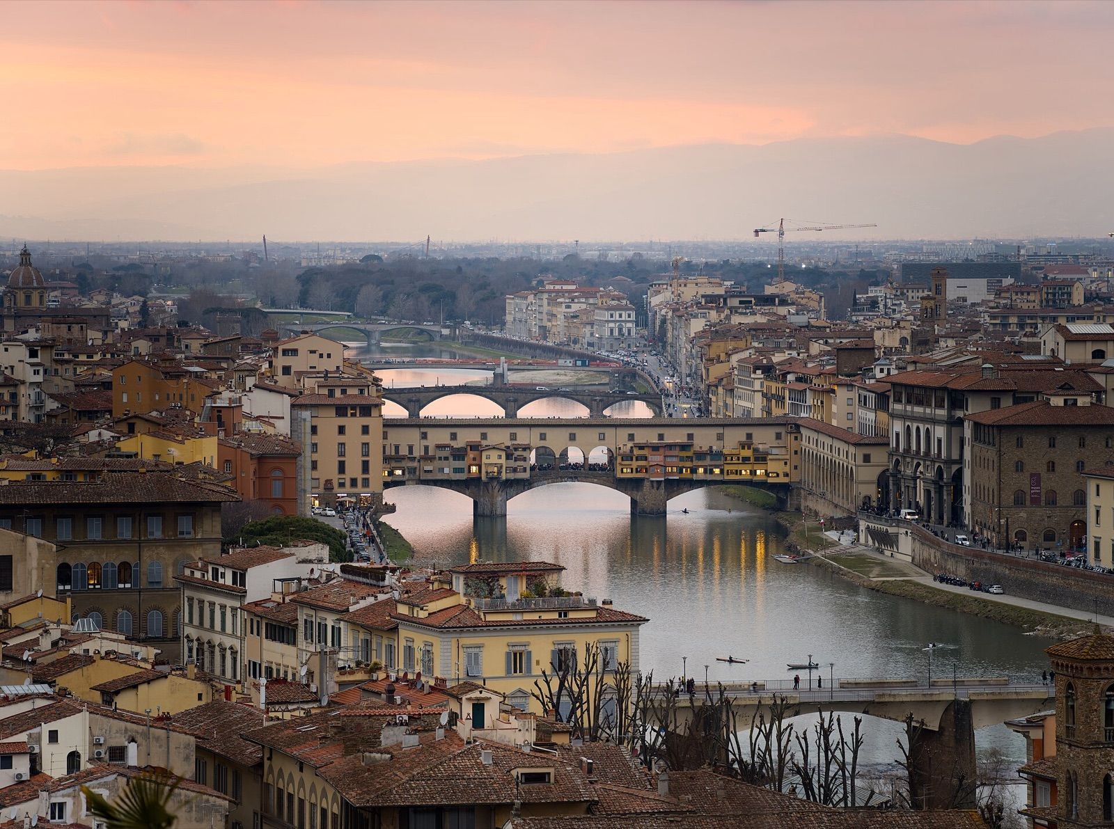 The Ponte Vecchio and the River Arno in Florence at sunset, seen from Piazzale Michelangelo
