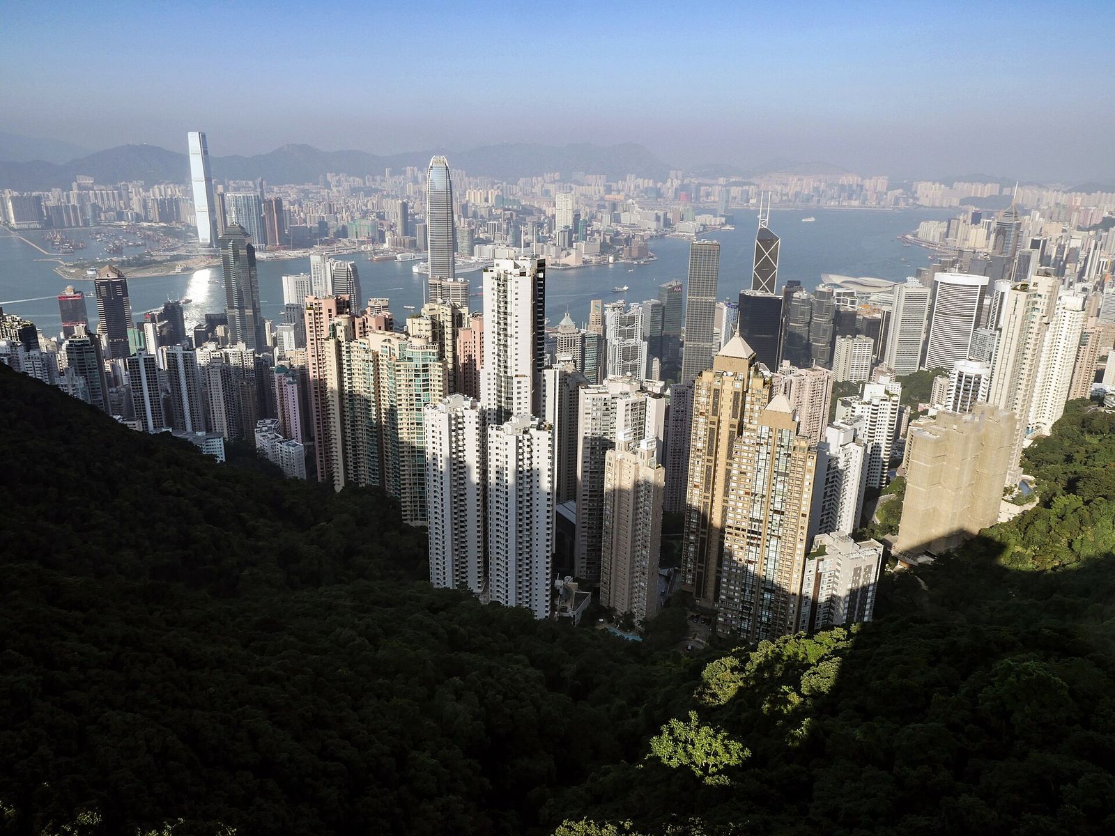 The towers of Hong Kong Island and Victoria Harbour seen from Victoria Peak, with Kowloon beyond
