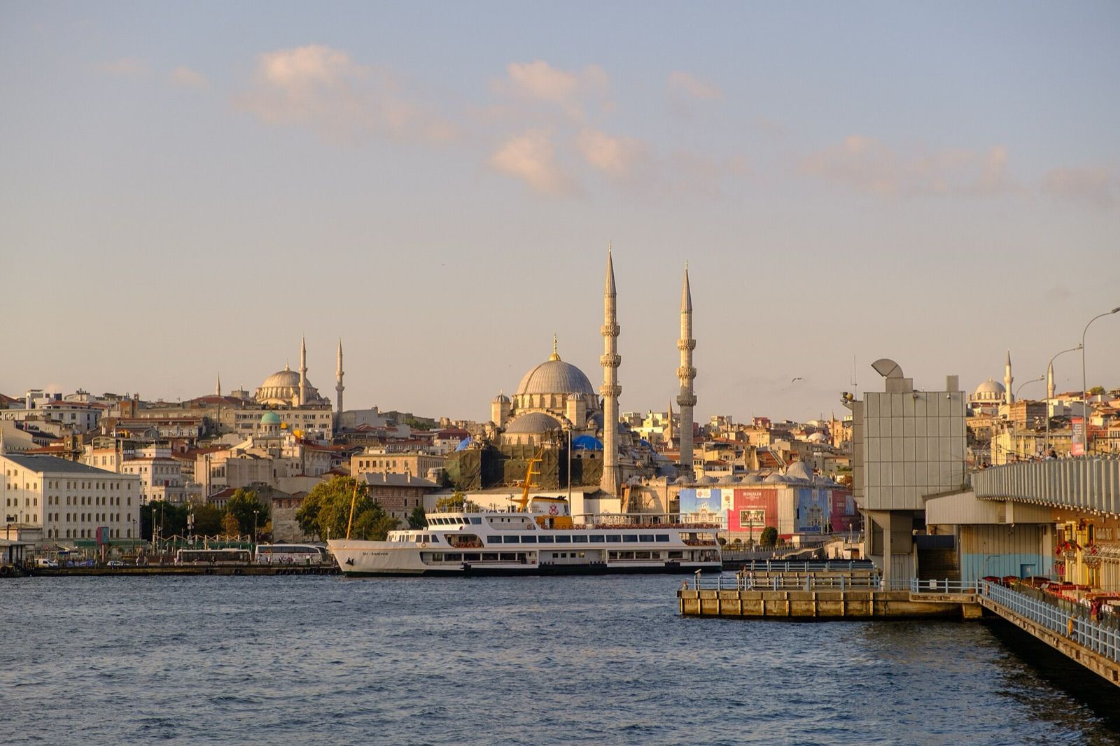 The Eminönü waterfront and the New Mosque seen across the Golden Horn from the Galata Bridge in Istanbul