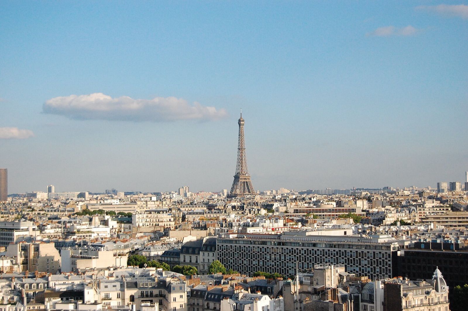 Paris rooftops stretching towards the Eiffel Tower