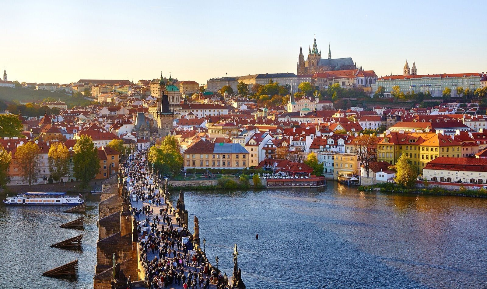 Charles Bridge and the Vltava river in Prague, with Malá Strana and Prague Castle behind