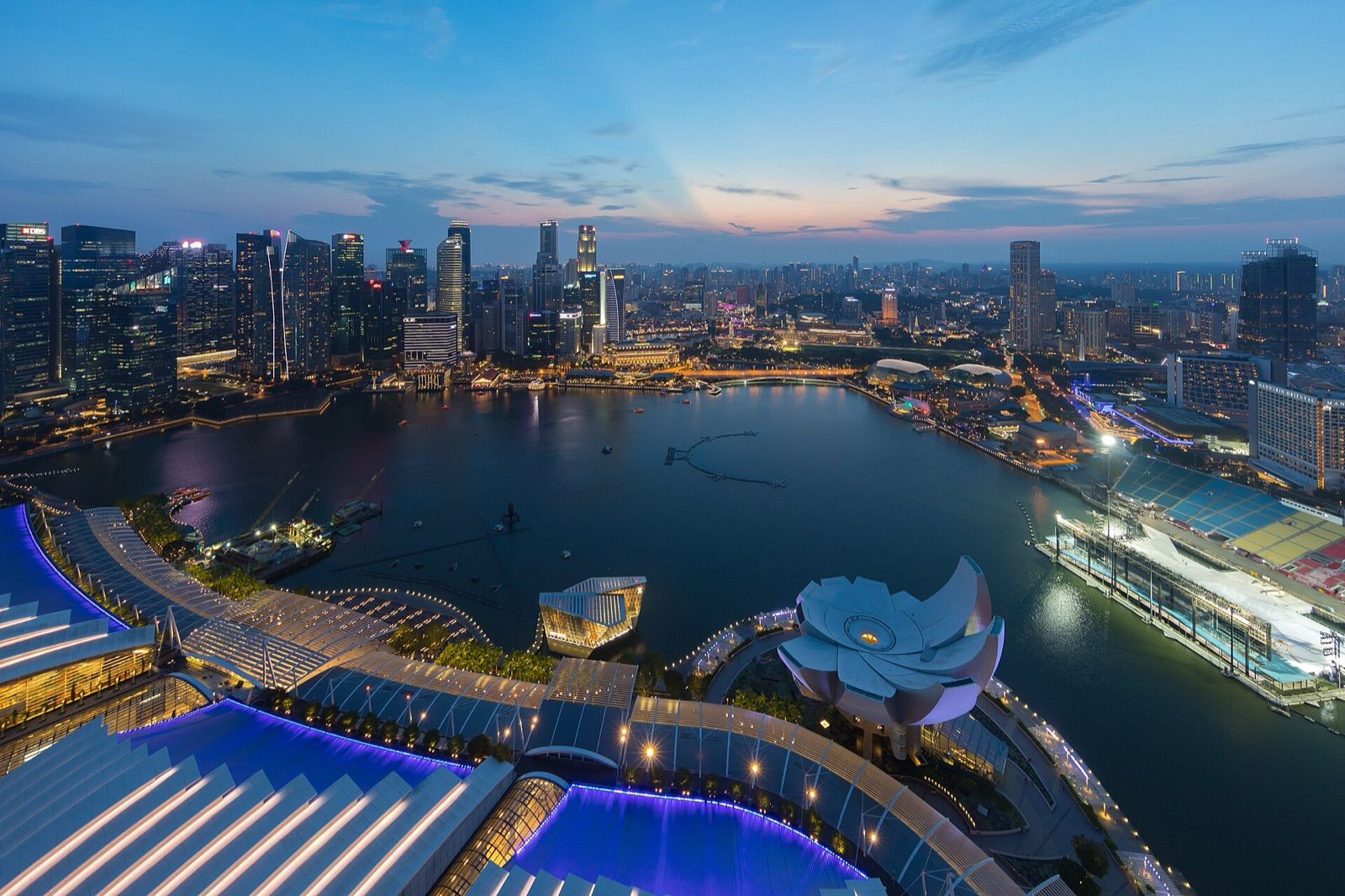 Marina Bay and the skyscrapers of Singapore's Central Business District at dusk